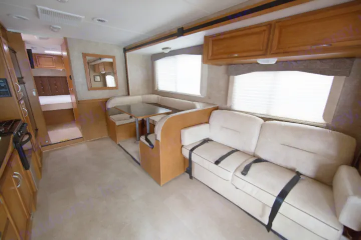 Seating and dinette area. Winnebago Minnie Winnie 31K 2014