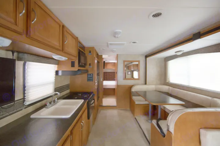 Kitchen and dinette area. Winnebago Minnie Winnie 31K 2014