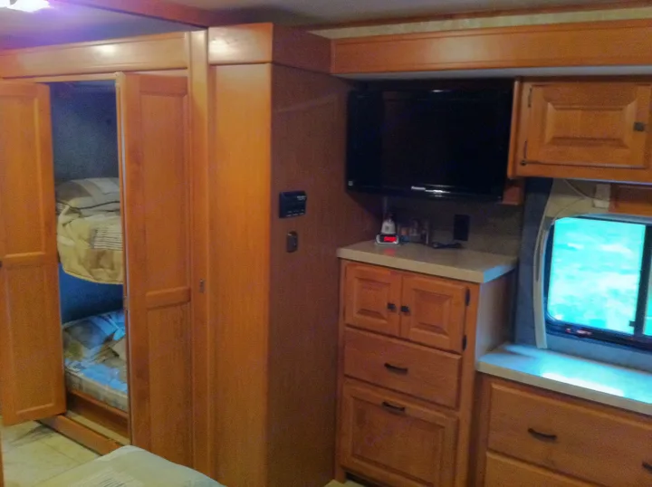 Bunks have doors and each bunk has a DVD player with wireless head sets.. Tiffin Motorhomes Tiffin Allegro Rear Engine Diesel 2011