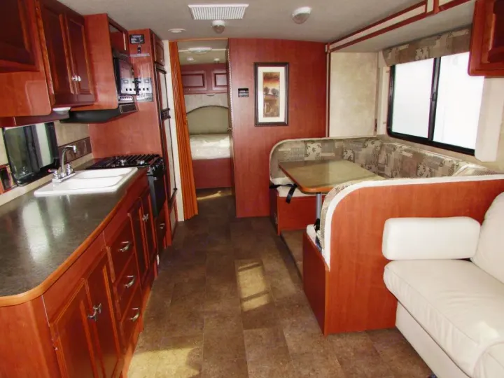 Interior example with slide IN. SPACIOUS countertop for food prep.. Winnebago Vista 2014