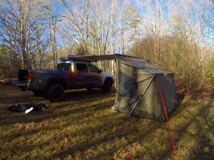 Here is the truck with the 3 man tent attached at a campsite. It is the perfect fit for any site, leaving you lots of room to chill near the fire, grill out or play some games. You can also hang out under the awning. You enter in the tent from underneath the awning so you are sure to stay dry and in the shade. Toyota Tacoma 2016