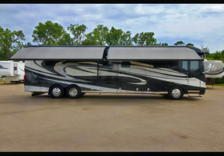 Outside with both awnigs extended. . Newmar Dutch Star 2016