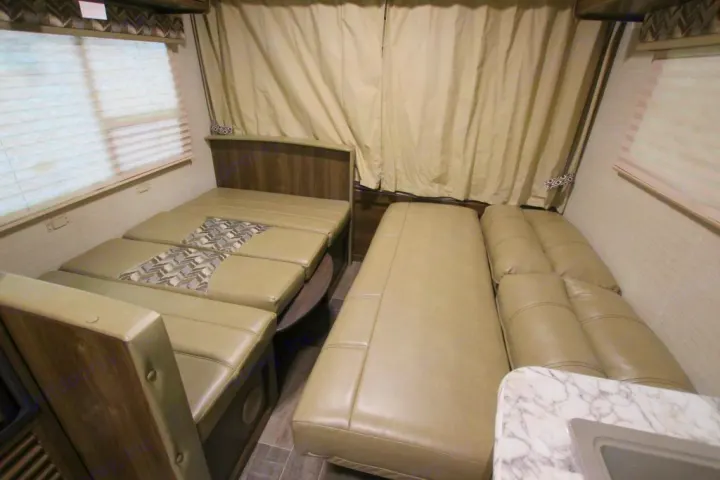 Dinette and Jacknife sofa set up as beds. Keystone Bullet Crossfire 2018
