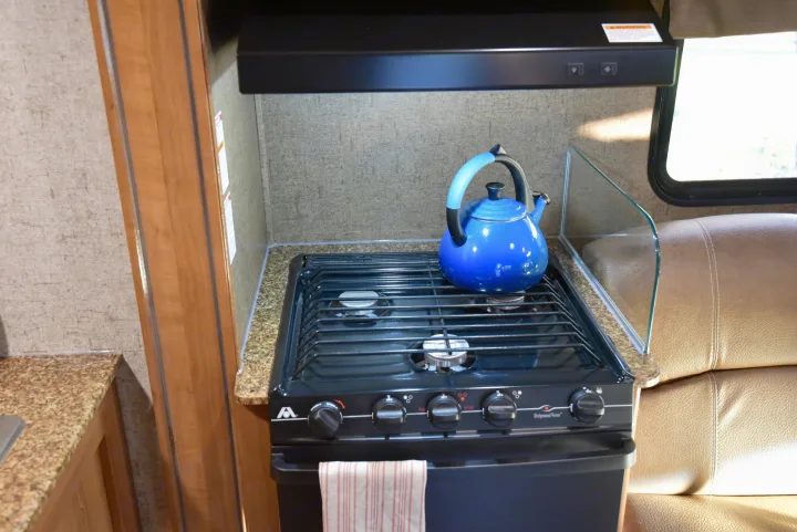 Stove/Oven (microwave above range hood). Coachmen Leprechaun 2018