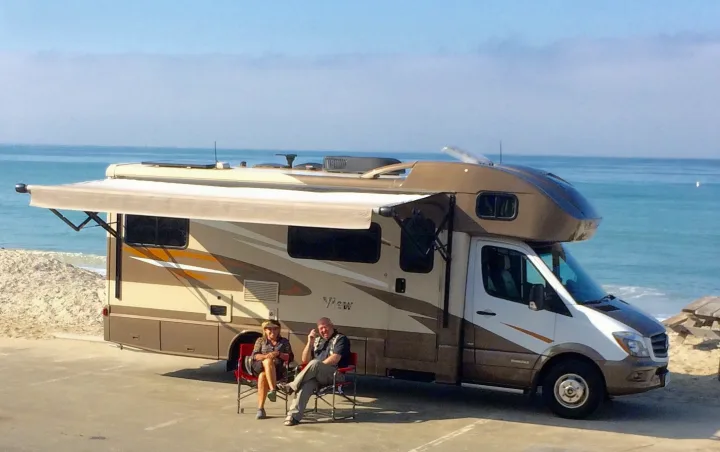 Enjoy your surroundings so much more when using this 16 ft by 9 ft awning trimmed with lights making outdoor living so much more accommodating.  The slide is automatic & takes about 2 minutes to open or close.  . Winnebago View 2017