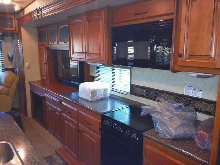 As much counter top and as nice acabinets as many homes.. Heartland Big Country 2011
