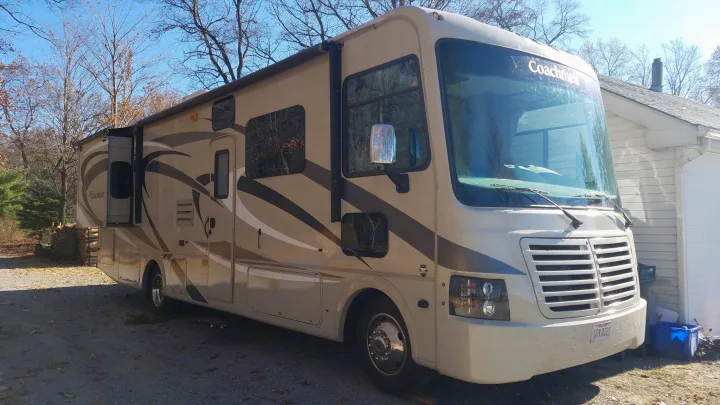 1 slide for the back bedroom. There is another slide on the other side for the kitchen / common area. . Coachmen Pursuit 2014