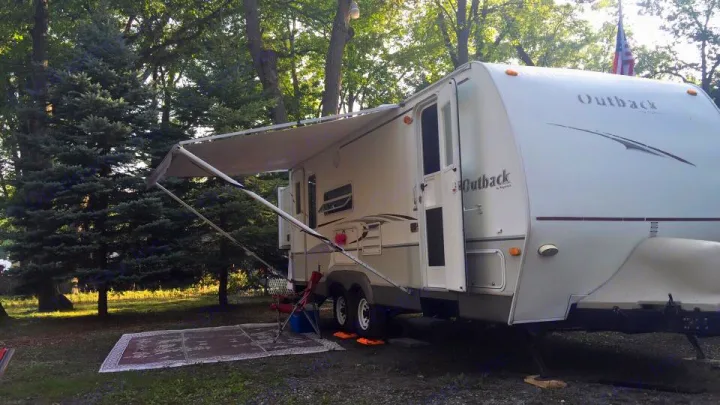 Set up and ready to enjoy. Awning covers the backdoor. . Keystone Outback 2007