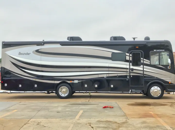 Mac from the passenger side. . Fleetwood Bounder 2017