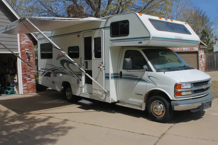 Nice Awning Easy to set up and take down giving you an easy way to have great shade all day.. Itasca Spirit 2001