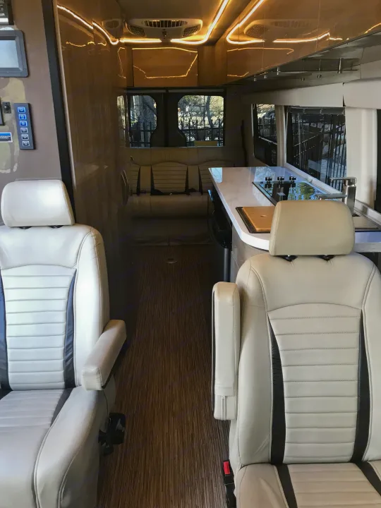 Middle captain chairs and bench seat in the back. . Mercedes Winnebago Era 2017