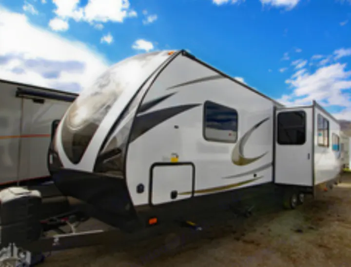 White travel trailer RV rental with door open & slide-out extended, parked outside. Ideal for your next adventure.. Heartland Sundance 2019