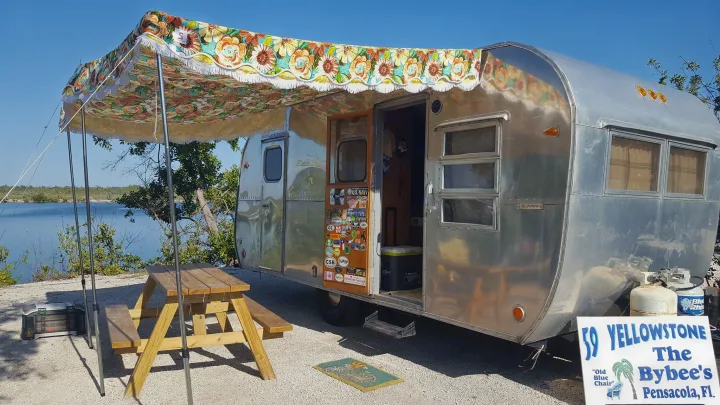 Restored 1959 Yellowstone. 19 ft. Birch wood interior with original stove, refrigerator, and locks. Ambient lighting will have you sleeping like a baby on 4 inch foam mattress.  . Yellowstone Yellowstone 1959