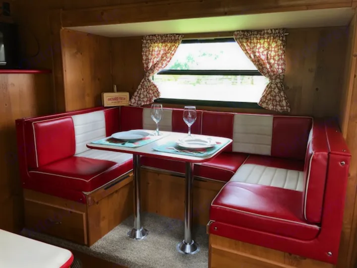 U shaped Dinette in slide out with large picture window and under seat storage- converts to bed  . Gulf Stream Cruiser 2018