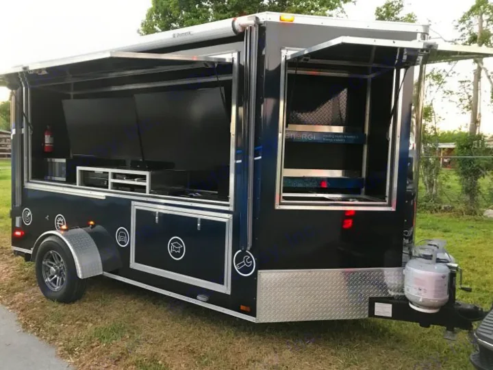 This custom black display trailer is unlike typical rv rental options, offering interactive screens & propane power.. GameDay Mobile Marketer GameDay Mobile Marketer 2020