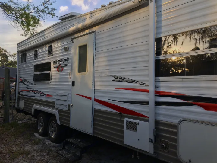 Side of camper with door and awning.. Other Other 2006