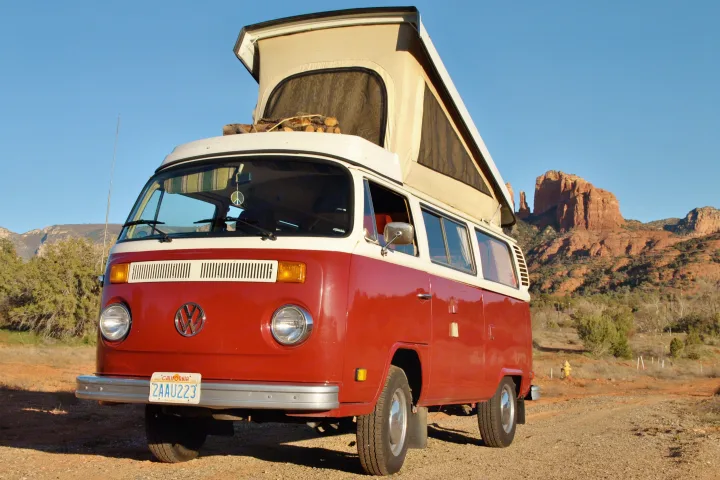 Classic red & white VW camper: Perfect RV rental for scenic red rock adventures.. Volkswagen Westfalia 1978