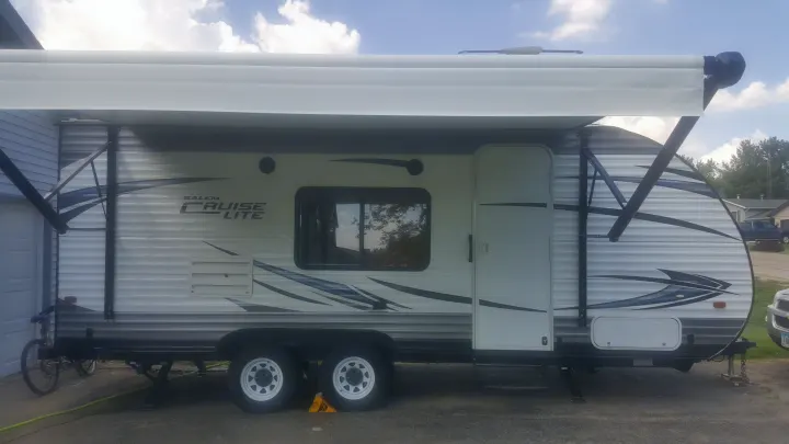 Salem Cruise Lite travel trailer with awning extended, perfect for your next RV rental adventure.. Forest River Salem Cruise Lite 2017