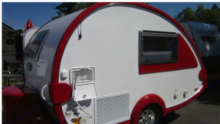 A sleek white and red teardrop RV rental, perfect for compact travel. See its side details, including utilities.. T@B Q Floorplan Maxx Package 2016