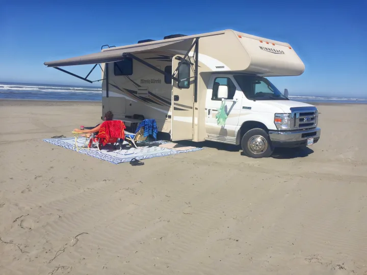 The awning is great for those sunny beach days, like this one at Ocean Shores.. Winnebago Minnie Winnie 2016