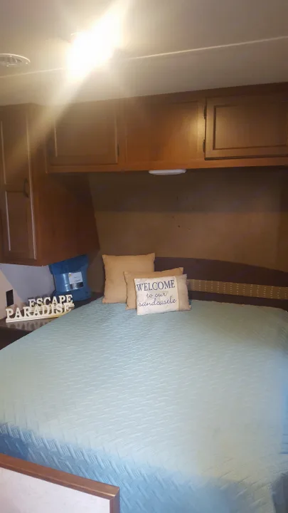 Master bedroom with a queen set mattress.. Jayco Jay Flight 2015