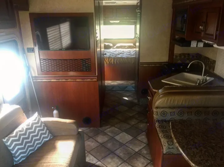 Large main living area. Thor Motor Coach Freedom Elite 2014