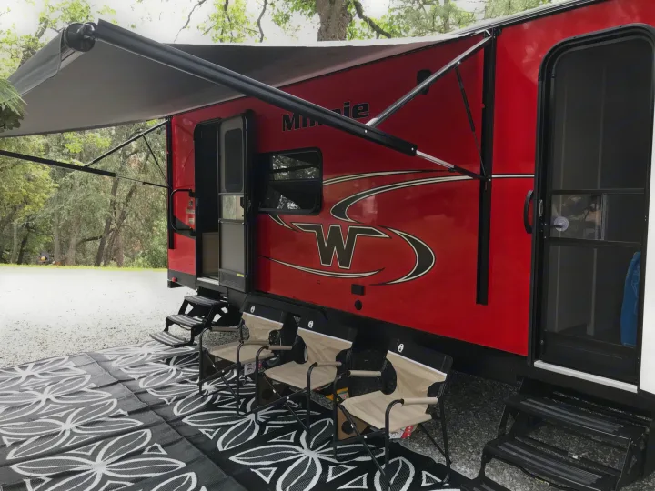 Outside living space featuring full size awning and outdoor rug.. Other Other 2018