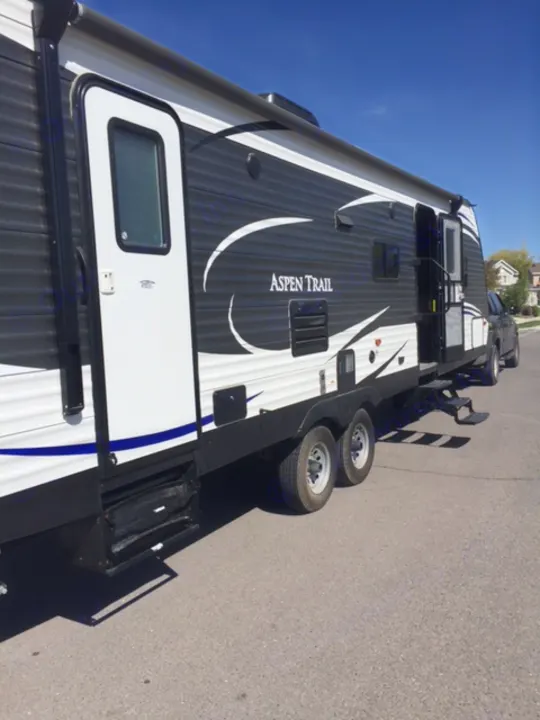 Outside of trailer. Bathroom has a door so its easier to keep kids from running through the trailer to wash hands or go to the bathroom:) . Dutchmen Aspen Trail 2017