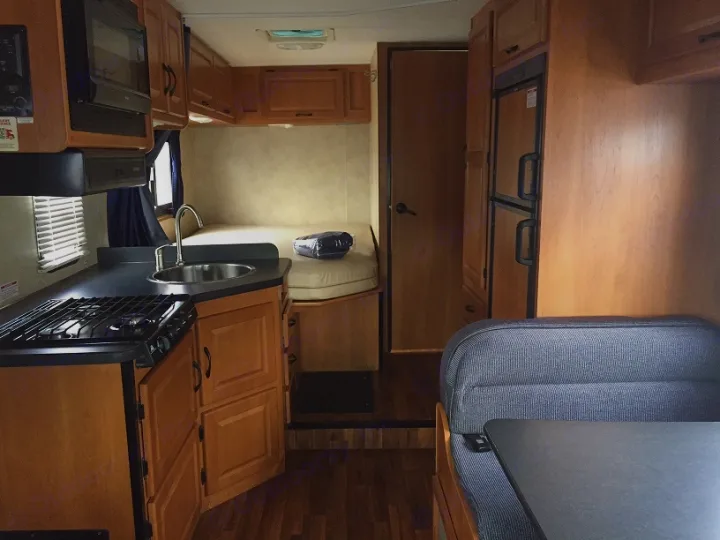 Galley, dinette and rear bed. Thor Majestic 2013