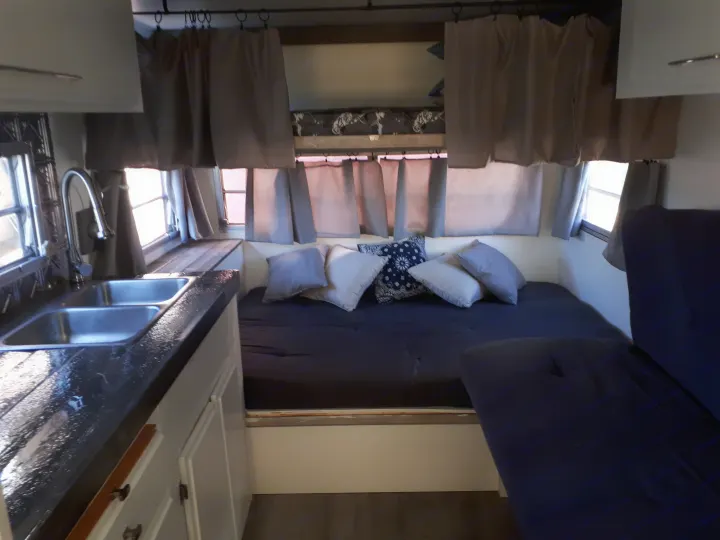 Back bed is a full double with a single bunk above. Headboard with storage and a reading light make for a cozy nook.. Other Other 1989