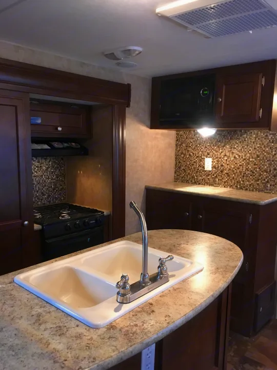 Beautiful kitchen with island. Venture Rv Sporttrek 2014