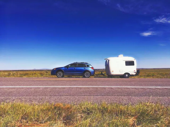 Junebug the camper being towed by our Subaru Crosstrek, somewhere in New Mexico.. Other Other 1984