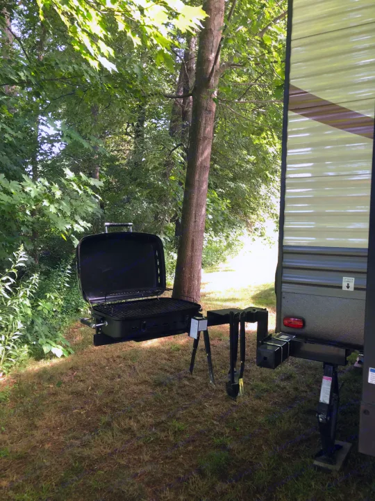 The grill hooks to the camper propane.  Works well. . Palomino Puma 2017