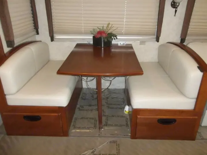Dining table that folds down and turns into a bed. Fleetwood PaceArrow 2004