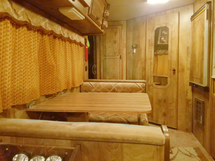Dining area that also folds down to a bed. Kit Road Ranger 1984