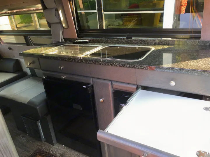 Sink, stove and microwave on drivers' side.. Roadtrek Roadtrek Class B 2015
