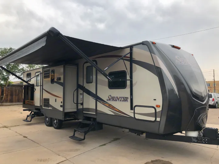 Electric Awning for plenty of shade.. Keystone Sprinter 2015