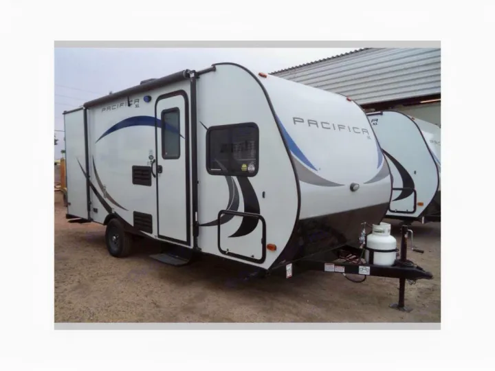 Outside with awning, extra storage, and electrical plugs.. Pacific Coachworks Pacifica XL 2018
