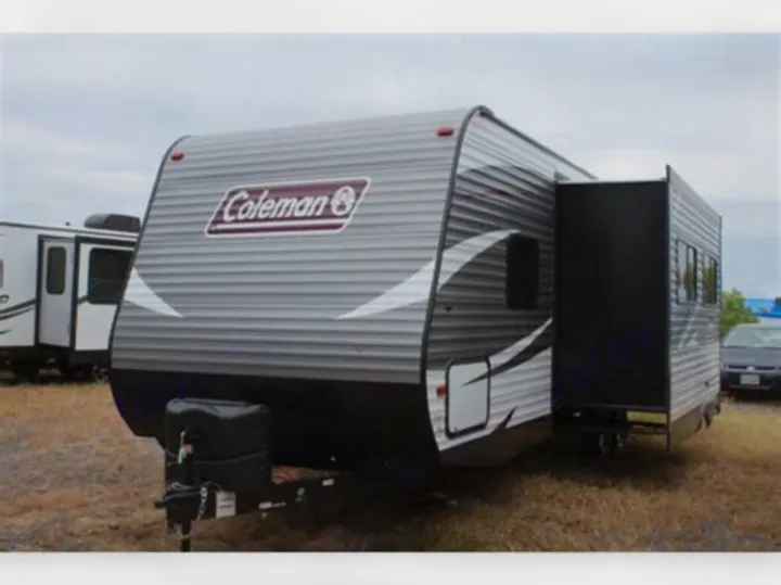 Front of camper and slide out located at booth . Coleman COLEMAN CM244BH18 2018
