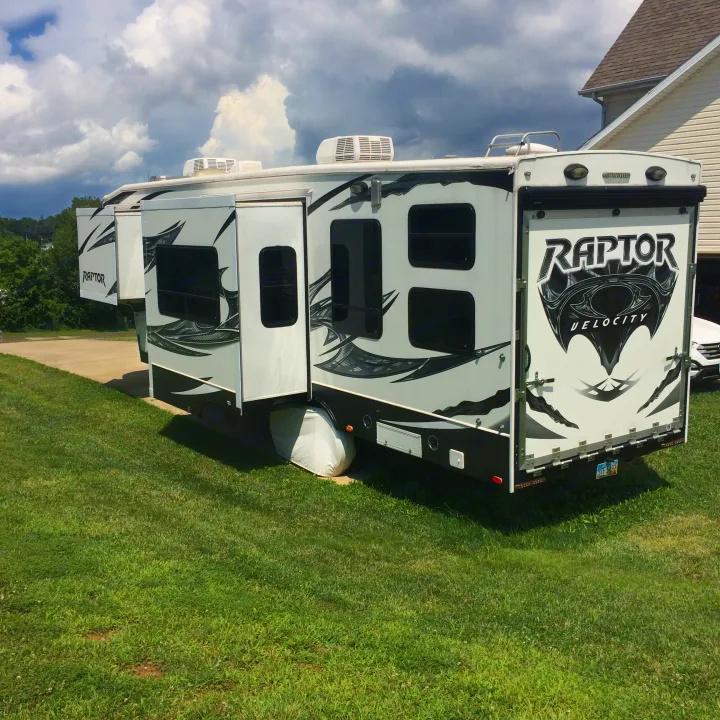 LH & rear with slide outs extended. Keystone Raptor Velocity Ed. RP300MP12 2012