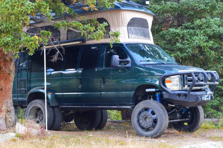 Always finding just the perfect spot.. Ford E350 Custom Off-road Conversion 2010