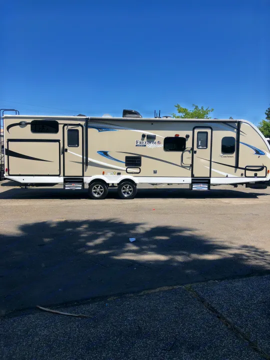 Has outdoor kitchen, speakers, shower & led awning. Coachmen Liberty Freedom Express 2018