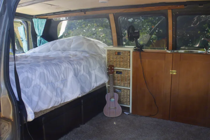 Vanny has a full size memory foam mattress and still has enough room to sit and play a game of connect four (also in the van) on the floor. Chevrolet Express 2500 2002