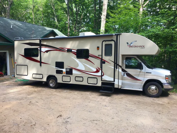 Has motorized awning with ‘antiflap’ technology. Jayco Redhawk 2014