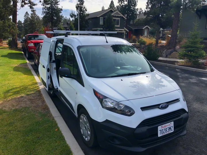 Side access doors on both sides. (Load bars too noisy and no longer installed.) A recent road trip of 4,000 miles throughout the PNW averaged 29mpg.. Ford Transit Connect SWB 2018