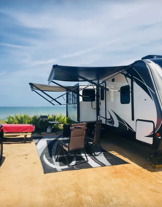 Two large awnings with outdoor speakers and LED lighting. 