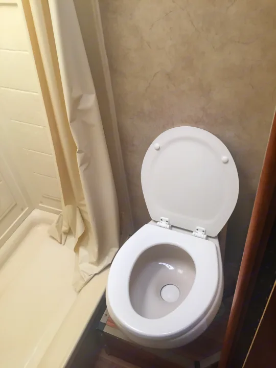 RV rental bathroom interior: compact. Ford Majestic 23A 2012