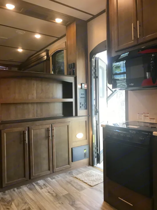 main entrance bookshelves dividing kitchen from living room.. Other Cougar367fls 2018