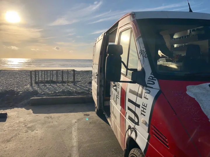 Slide Door for easy access when beach camping + allow for a nice sea breeze. Also, a little peak at the camper's brand new tires!. Dodge Sprinter 2500 170ext 2006
