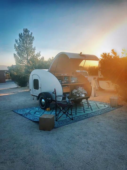 A perfect setup for one or two people. Everything you need stores ferfecy inside of this teardrop and is a grease to set up . American Teardrop Travel Trailer 2009